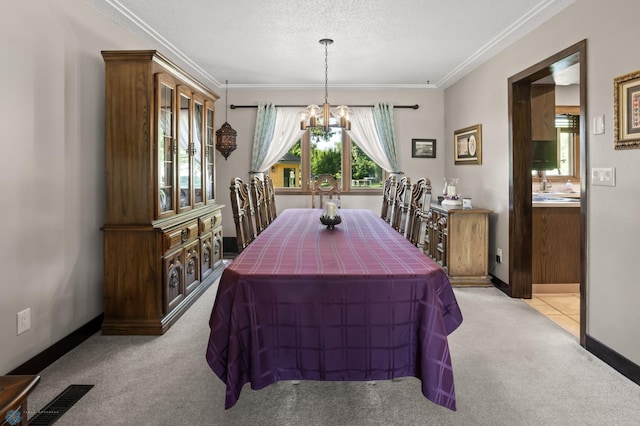 21 35th Ave NE, Fargo, ND 58102 - dining area featuring carpet floors, a chandelier, and crown molding