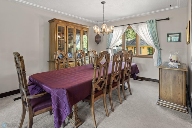 21 35th Ave NE, Fargo, ND 58102 - dining space featuring light carpet, a chandelier, and crown molding