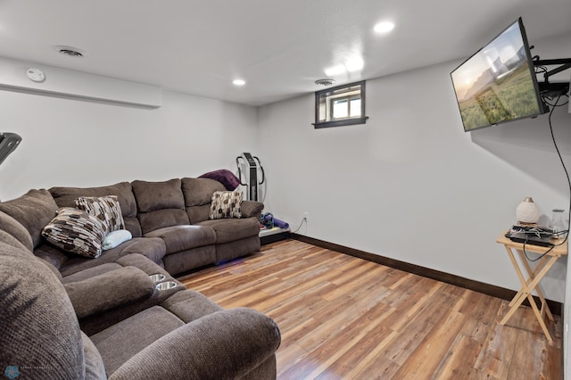 21 35th Ave NE, Fargo, ND 58102 - living room featuring light wood-type flooring and recessed lighting