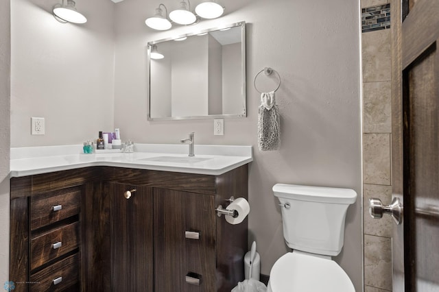 21 35th Ave NE, Fargo, ND 58102 - bathroom featuring toilet and vanity
