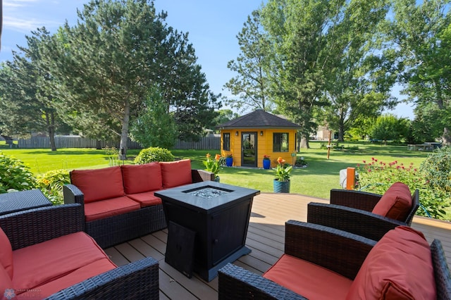 21 35th Ave NE, Fargo, ND 58102 - wooden terrace with an outbuilding and an outdoor living space with a fire pit