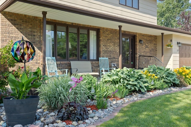 21 35th Ave NE, Fargo, ND 58102 - view of exterior entry with a porch and brick siding