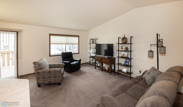 34 Cedar Dr, Mapleton, ND 58059 - living room with lofted ceiling, healthy amount of natural light, and carpet flooring