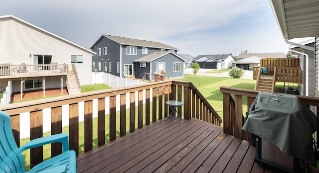 34 Cedar Dr, Mapleton, ND 58059 - wooden terrace featuring a residential view, stairs, area for grilling, and a fenced backyard