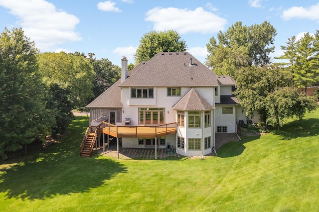 4803 Chantrey Pl, Minnetonka, MN 55345 - rear view of property featuring stairway, a wooden deck, a lawn, stucco siding, and a sunroom