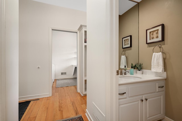 4803 Chantrey Pl, Minnetonka, MN 55345 - bathroom featuring hardwood / wood-style floors and vanity