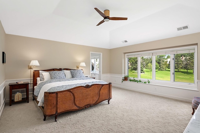 4803 Chantrey Pl, Minnetonka, MN 55345 - bedroom featuring light colored carpet, vaulted ceiling, wainscoting, and ceiling fan