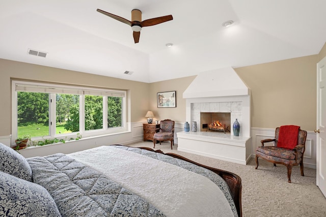 4803 Chantrey Pl, Minnetonka, MN 55345 - bedroom with carpet, wainscoting, a fireplace, a ceiling fan, and lofted ceiling