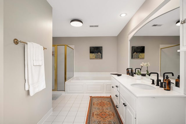4803 Chantrey Pl, Minnetonka, MN 55345 - full bathroom featuring a shower stall, a bath, double vanity, tile patterned floors, and recessed lighting