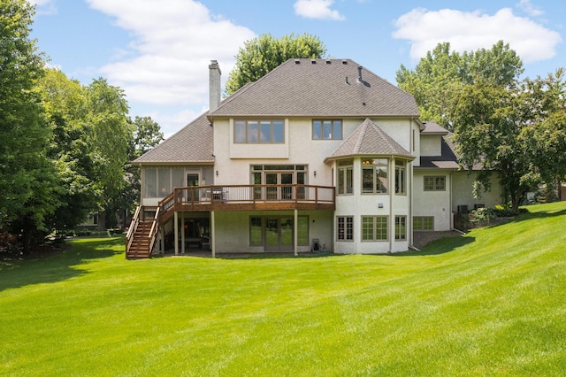4803 Chantrey Pl, Minnetonka, MN 55345 - rear view of property with a sunroom, stairway, stucco siding, and a chimney