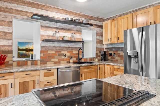 3322 277th Ave NW, Stanford Twp, MN 55040 - kitchen featuring stainless steel appliances, light brown cabinetry, decorative backsplash, and a textured ceiling