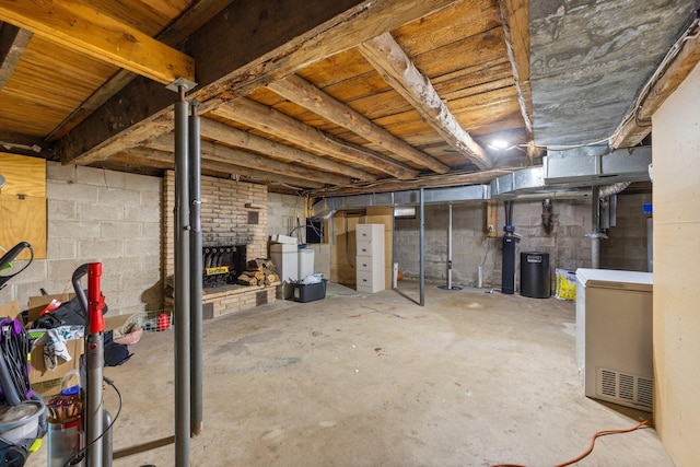 3322 277th Ave NW, Stanford Twp, MN 55040 - unfinished basement with refrigerator, a water softener system, and concrete block wall