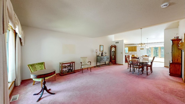 120 6th St SW, Chatfield, MN 55923 - sitting room featuring light colored carpet and a chandelier