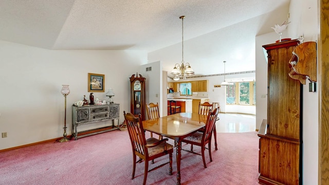 120 6th St SW, Chatfield, MN 55923 - dining area featuring vaulted ceiling, a chandelier, carpet, and a textured ceiling