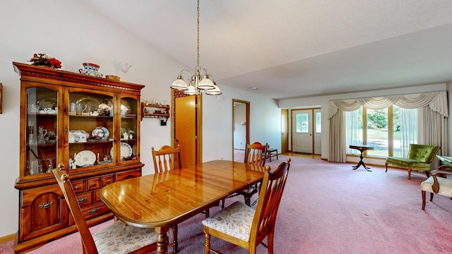 120 6th St SW, Chatfield, MN 55923 - carpeted dining room featuring a chandelier and vaulted ceiling
