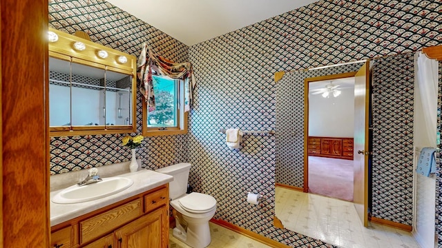 120 6th St SW, Chatfield, MN 55923 - bathroom with wallpapered walls, vanity, ceiling fan, and a shower