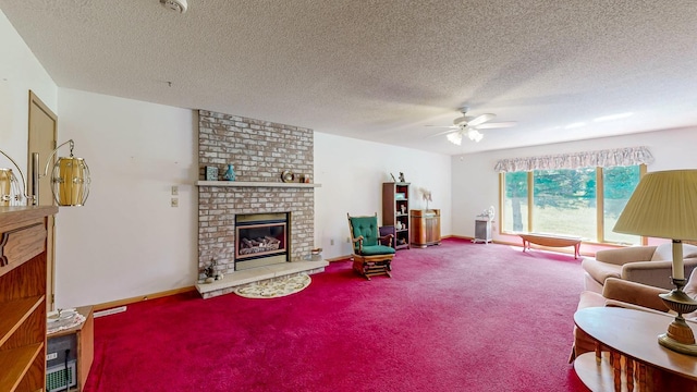 120 6th St SW, Chatfield, MN 55923 - carpeted living area with ceiling fan, a textured ceiling, and a brick fireplace