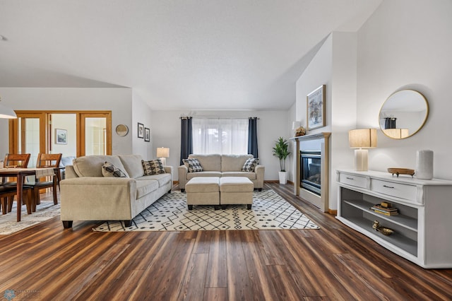 3437 26th Ave S, Fargo, ND 58103 - living room with dark wood-type flooring and a glass covered fireplace