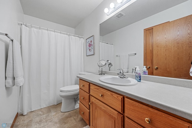 3437 26th Ave S, Fargo, ND 58103 - full bathroom with vanity and toilet