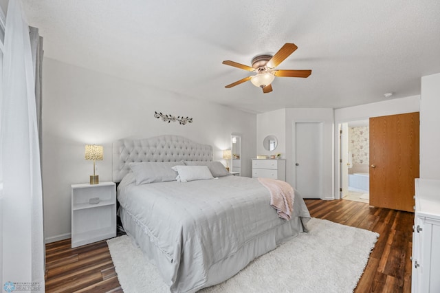 3437 26th Ave S, Fargo, ND 58103 - bedroom featuring dark wood-style floors, ensuite bathroom, and a ceiling fan