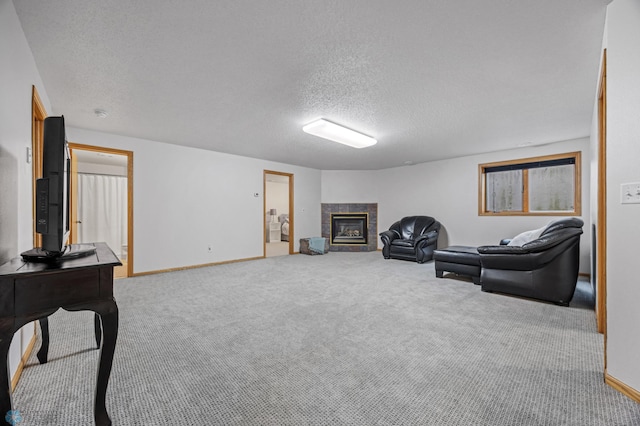 3437 26th Ave S, Fargo, ND 58103 - carpeted living area featuring a fireplace and a textured ceiling