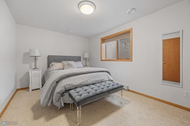 3437 26th Ave S, Fargo, ND 58103 - bedroom with carpet flooring and a textured ceiling