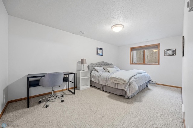 3437 26th Ave S, Fargo, ND 58103 - bedroom featuring carpet flooring and a textured ceiling