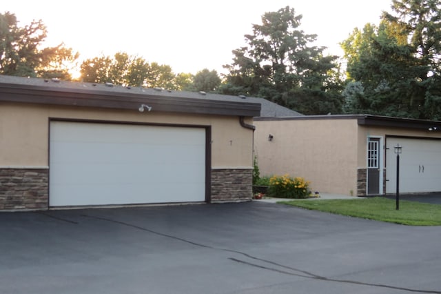 912 3rd St N Unit 7, Cold Spring, MN 56320 - view of front of house with stone siding and stucco siding