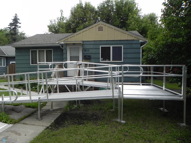1610 9th St N, Fargo, ND 58102 - view of front of home featuring roof with shingles