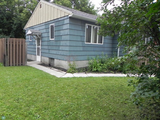 1610 9th St N, Fargo, ND 58102 - view of side of property featuring board and batten siding