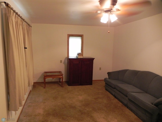 1610 9th St N, Fargo, ND 58102 - living room with a ceiling fan and light colored carpet