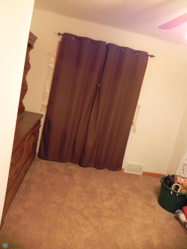 1610 9th St N, Fargo, ND 58102 - unfurnished bedroom with light carpet