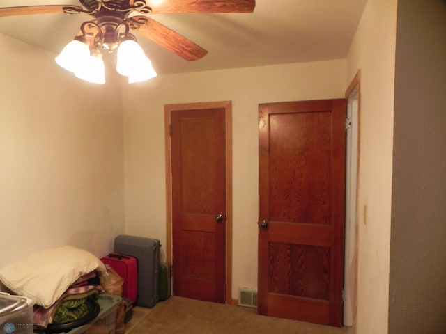 1610 9th St N, Fargo, ND 58102 - bedroom with carpet flooring and a ceiling fan