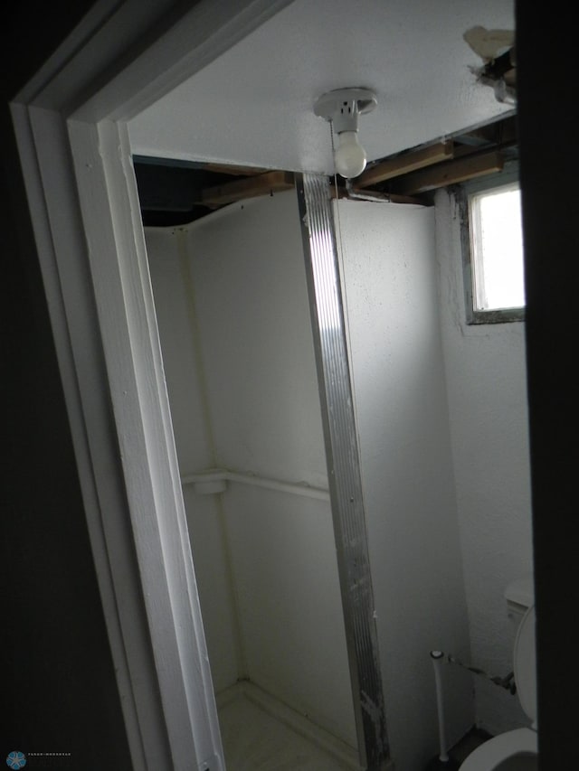 1610 9th St N, Fargo, ND 58102 - full bathroom with a stall shower and toilet