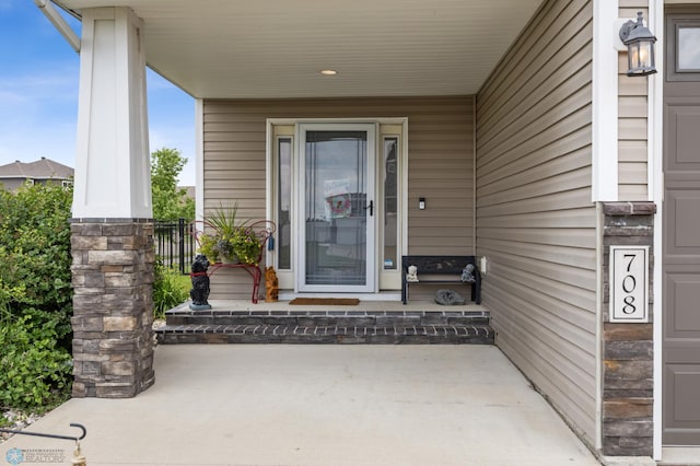 708 30th Ter E, West Fargo, ND 58078 - entrance to property with a porch