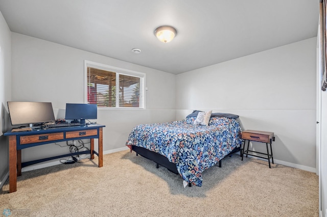 708 30th Ter E, West Fargo, ND 58078 - carpeted bedroom with a desk and baseboards