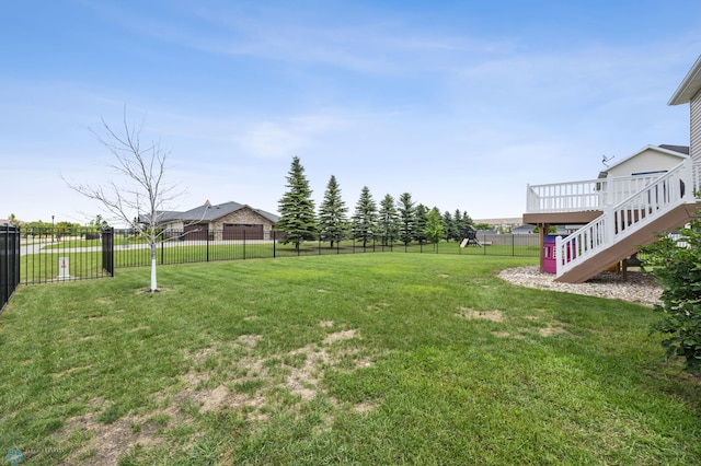 708 30th Ter E, West Fargo, ND 58078 - fenced backyard with stairs and a wooden deck
