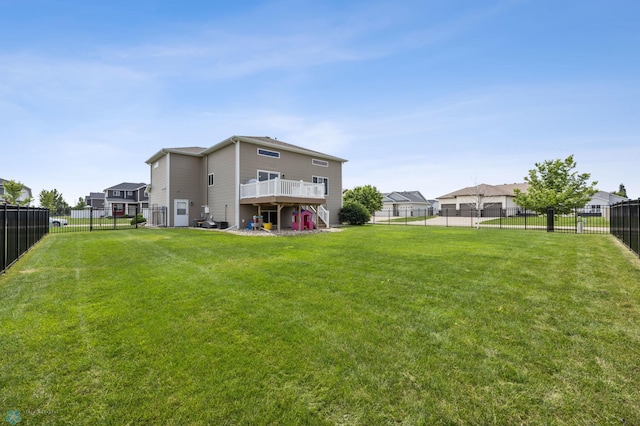 708 30th Ter E, West Fargo, ND 58078 - fenced backyard with a wooden deck