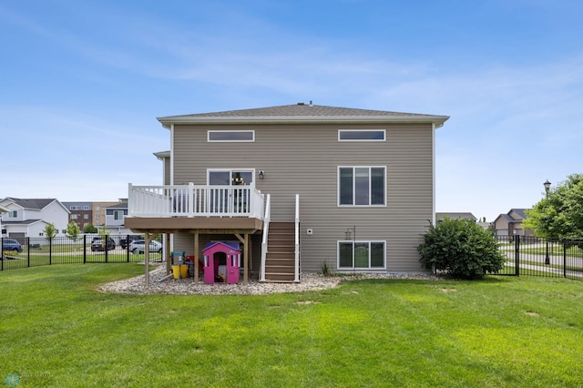 708 30th Ter E, West Fargo, ND 58078 - back of property featuring stairway, a wooden deck, and a fenced backyard