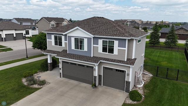 708 30th Ter E, West Fargo, ND 58078 - traditional home with a garage, roof with shingles, driveway, and a residential view