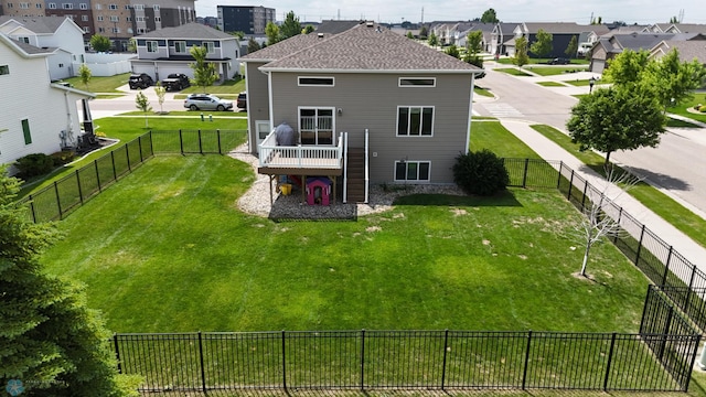 708 30th Ter E, West Fargo, ND 58078 - rear view of property featuring a residential view, a wooden deck, a fenced backyard, and stairs