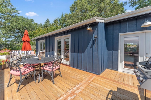 13491 80th St NW, Annandale, MN 55302 - deck with outdoor dining area, french doors, and area for grilling