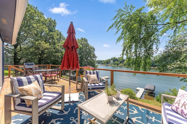 13491 80th St NW, Annandale, MN 55302 - wooden terrace featuring a water view and outdoor dining space