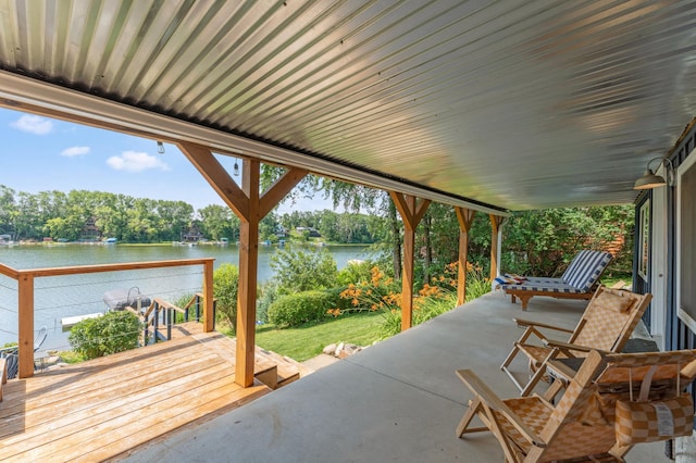 13491 80th St NW, Annandale, MN 55302 - view of patio with a water view and view of scattered trees