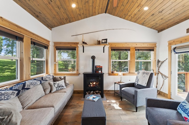 13491 80th St NW, Annandale, MN 55302 - living area with lofted ceiling, recessed lighting, hardwood / wood-style flooring, a wood stove, and wood ceiling