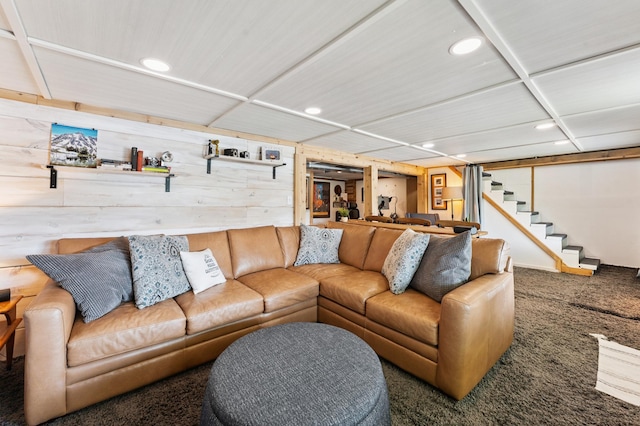 13491 80th St NW, Annandale, MN 55302 - carpeted living area with recessed lighting, stairway, and wood walls