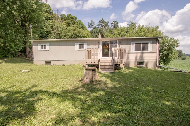 N6050 270th St, Lucas Twp, WI 54751 - manufactured / mobile home featuring a front lawn and a chimney