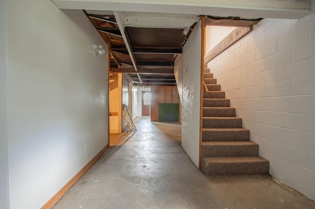 N6050 270th St, Lucas Twp, WI 54751 - unfinished basement with stairs and concrete block wall