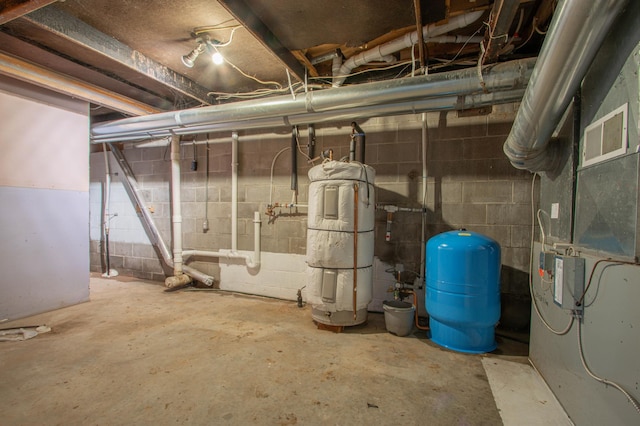 N6050 270th St, Lucas Twp, WI 54751 - unfinished below grade area with a water pressure tank and a central vacuum unit
