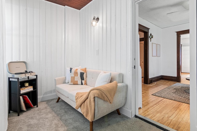 1066 Woodbridge St, Saint Paul, MN 55117 - sitting room featuring baseboards and wood finished floors